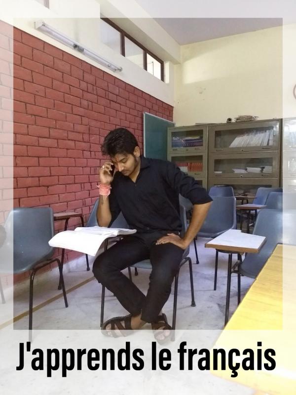 Hari learning french language at school
