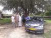 Hari and Rajendra with tourists - Toyota Etios car